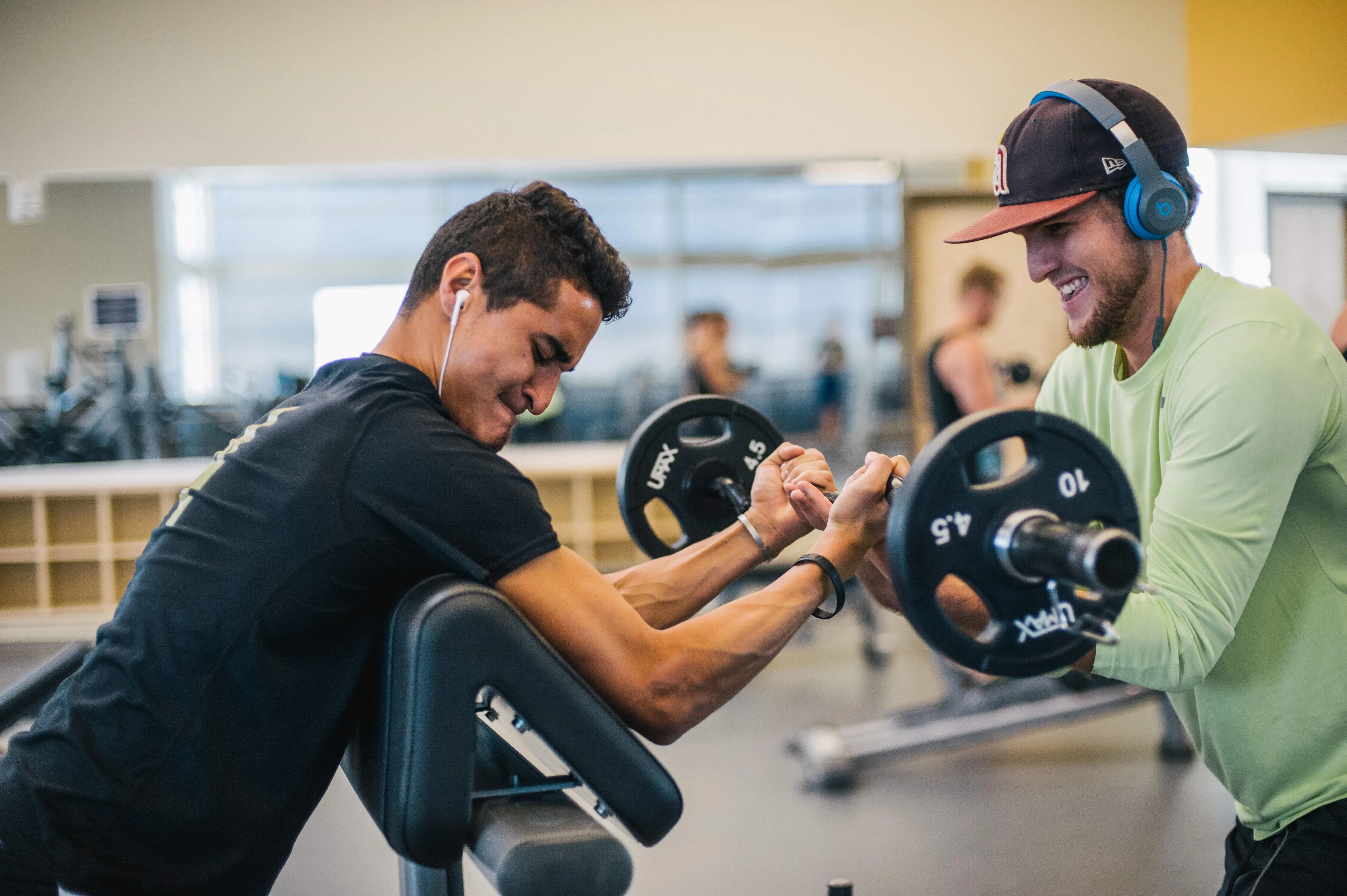 students working out together in the rec center gym